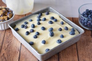 Remaining pudding and blueberries sprinkled on top