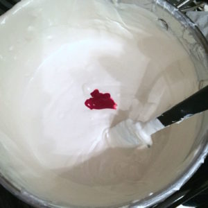 Adding pink dye to the candy melts