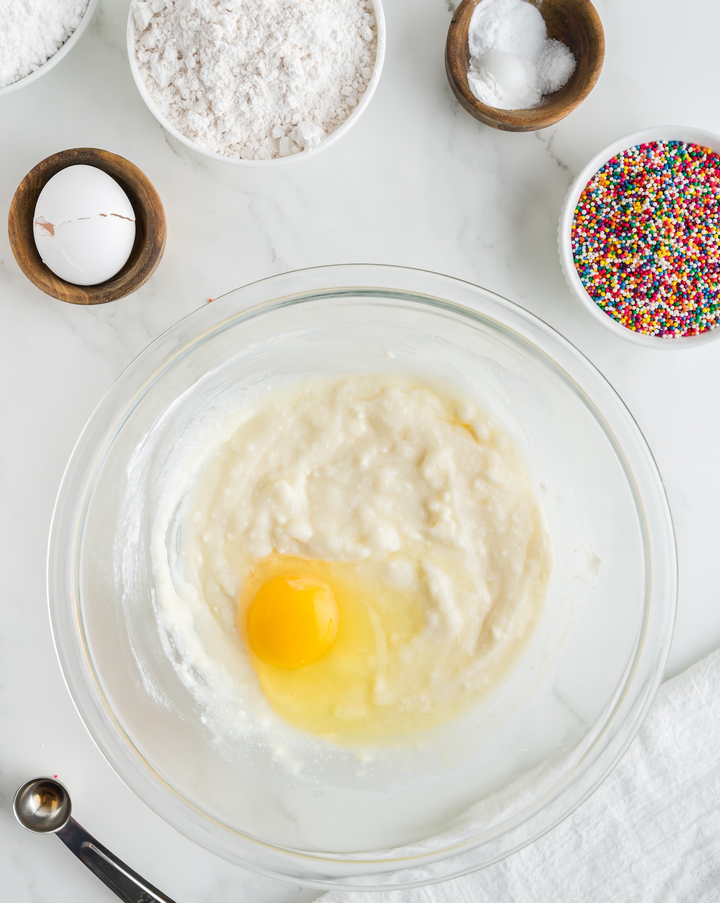 Adding the egg to the sour cream mixture