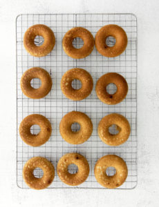 Baked donuts cooling on a wire rack