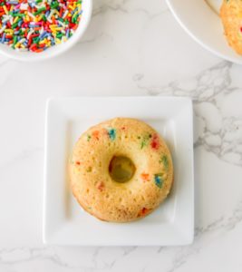 Donut flipped onto the plate to cool