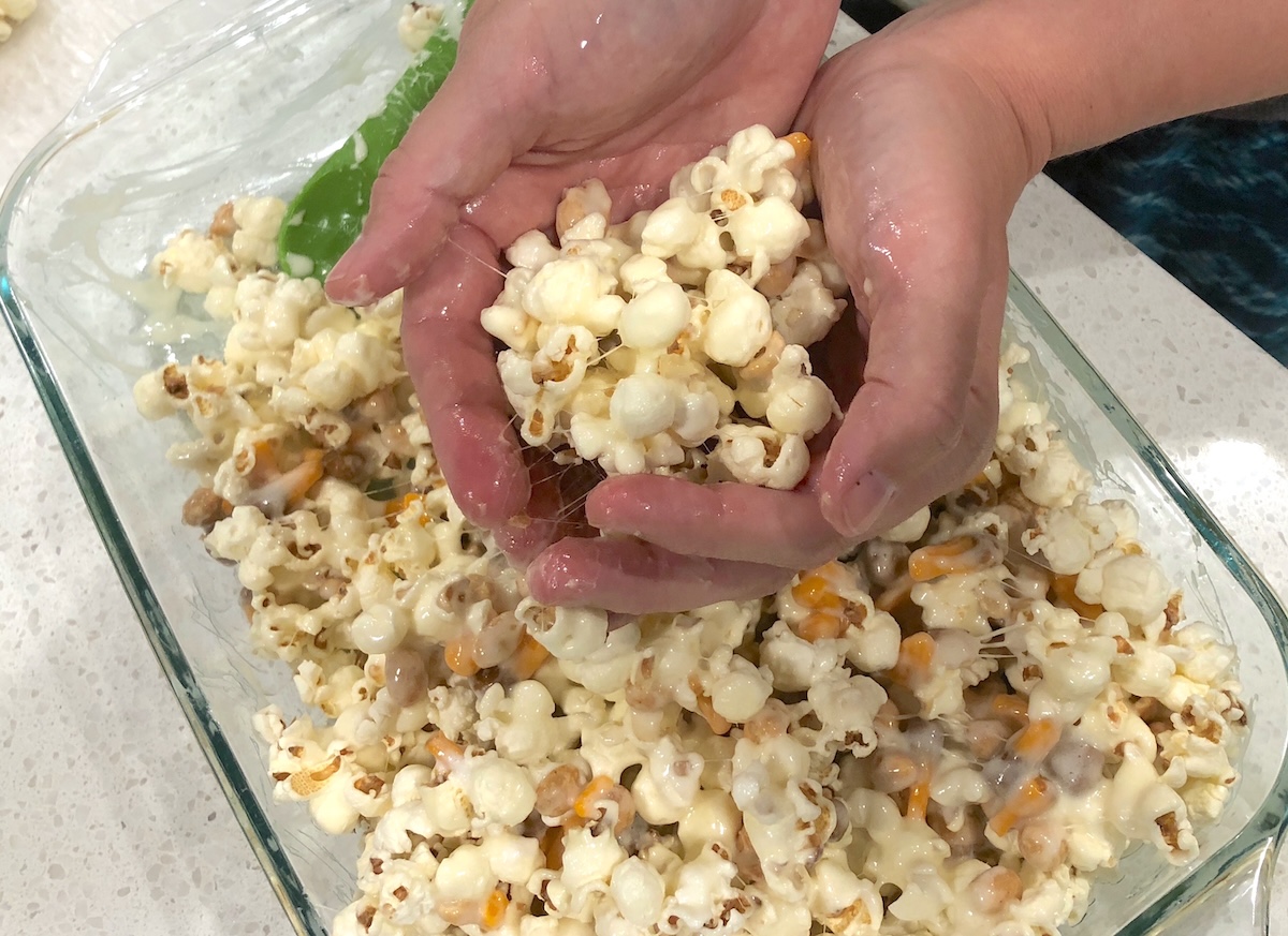 Forming the Halloween popcorn balls