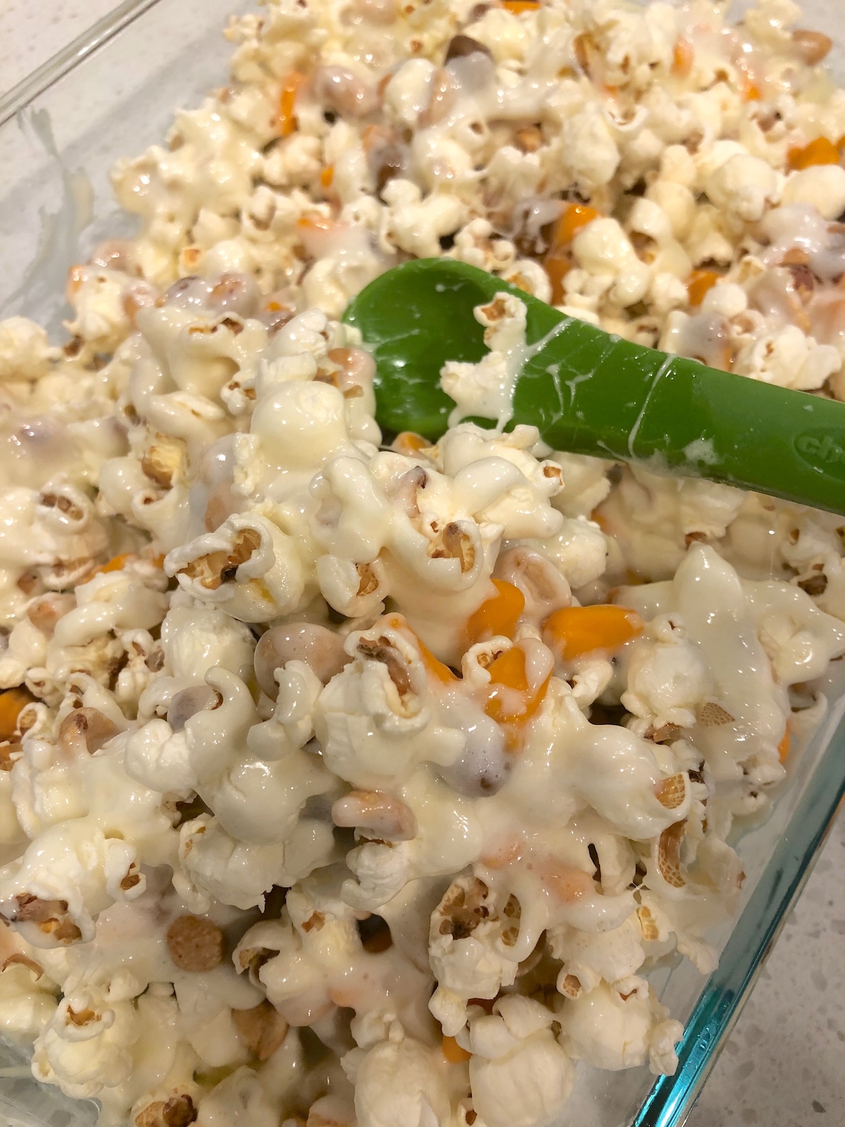 Stirring the popcorn bottles