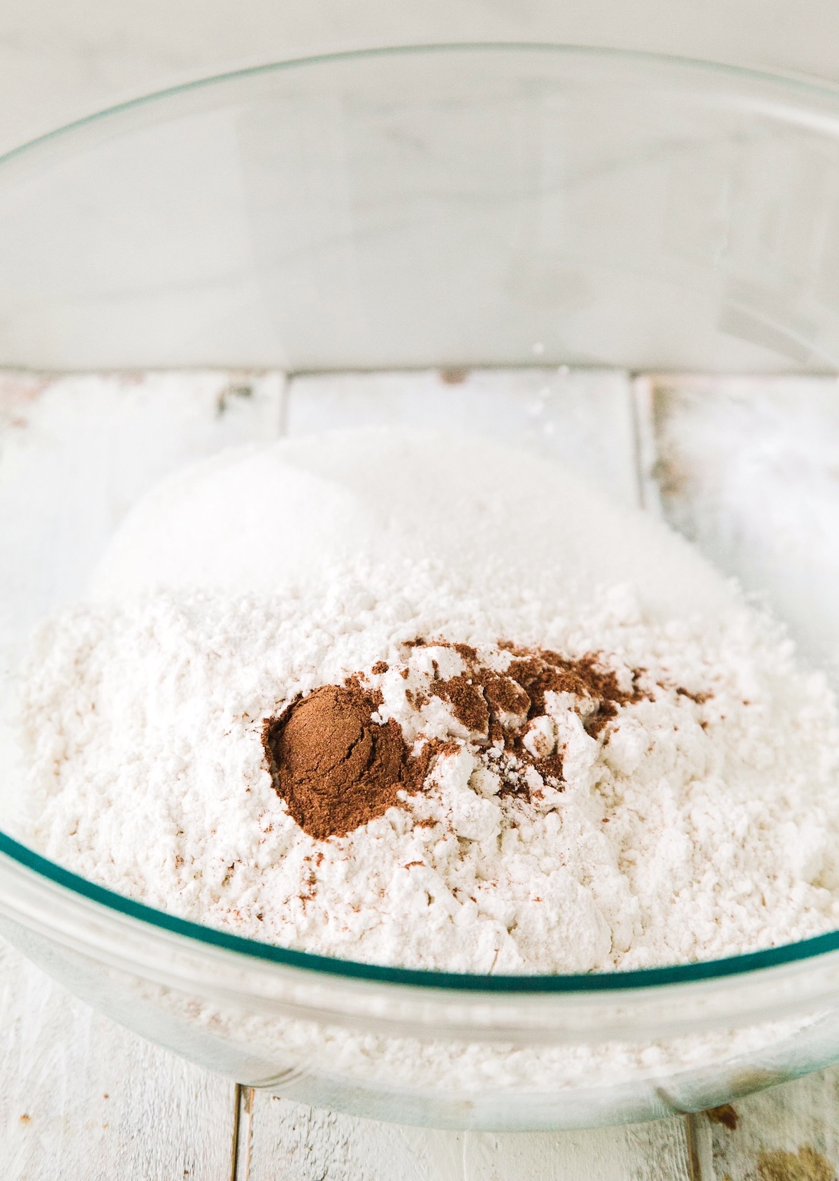 sugar, flour, baking soda, baking powder, salt, and pumpkin pie spice in a large bowl