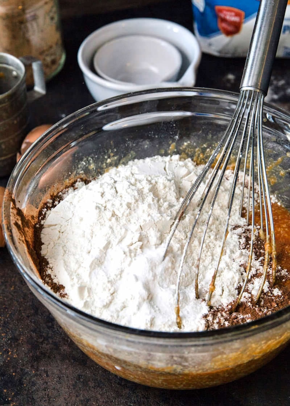 Adding batter and the chocolate chips to the flour mixture