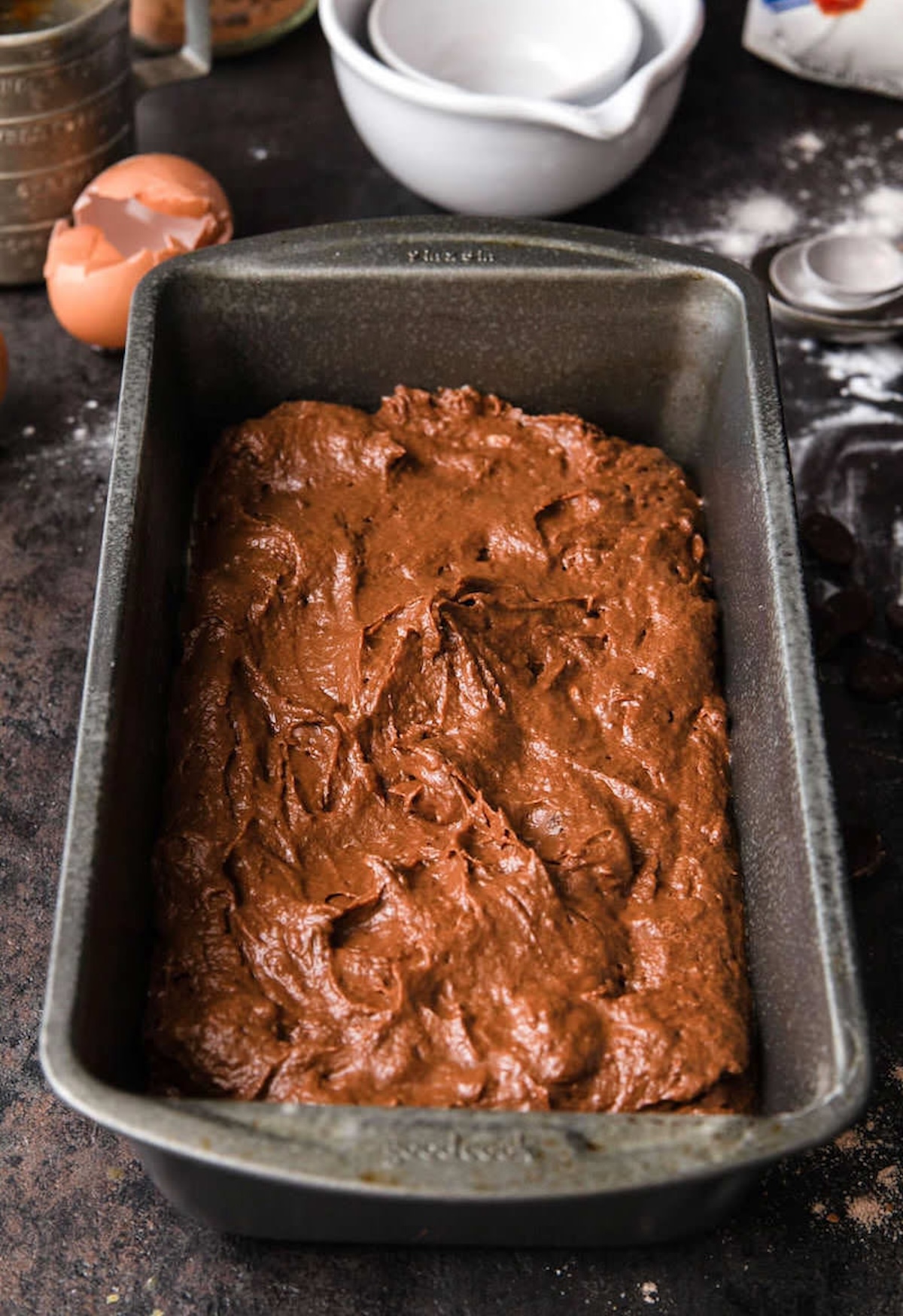 Chocolate pumpkin bread batter spread in a pan