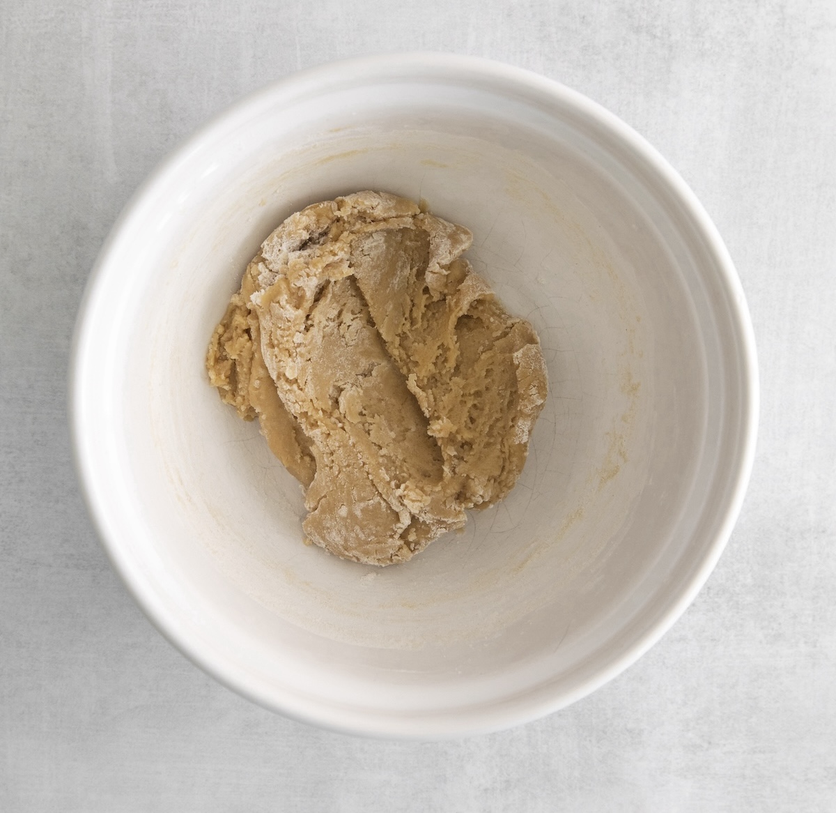 Flour and baking soda added to dough