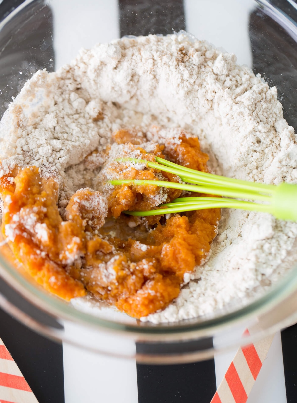 Mixing pumpkin ingredients in a bowl