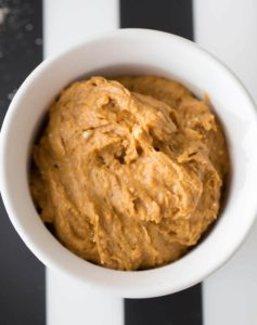 Pumpkin batter placed in a mug