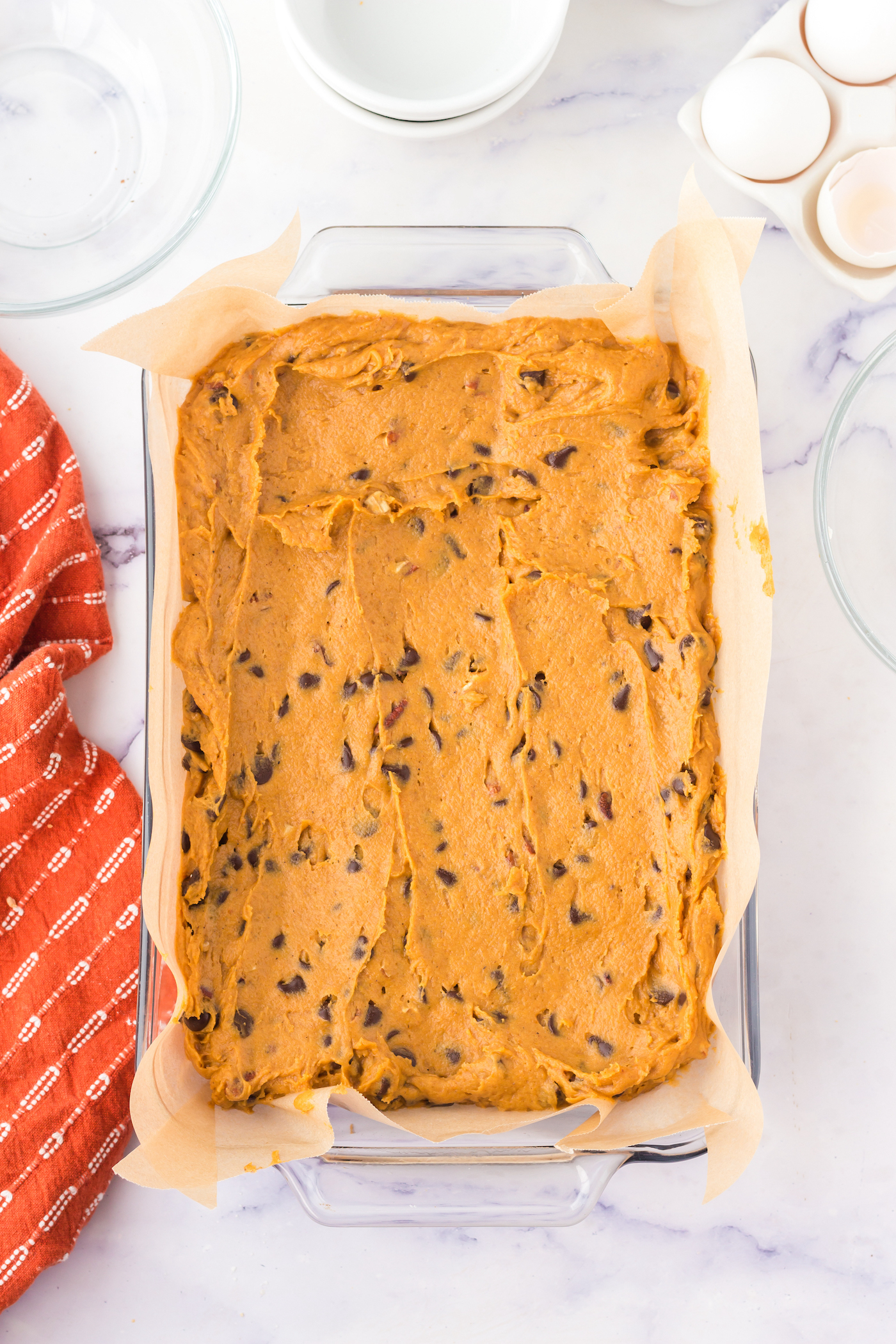 Pumpkin blondie batter spread in the pan