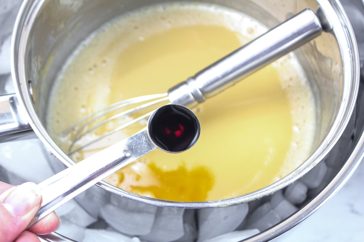 Adding in vanilla to the ice cream mixture