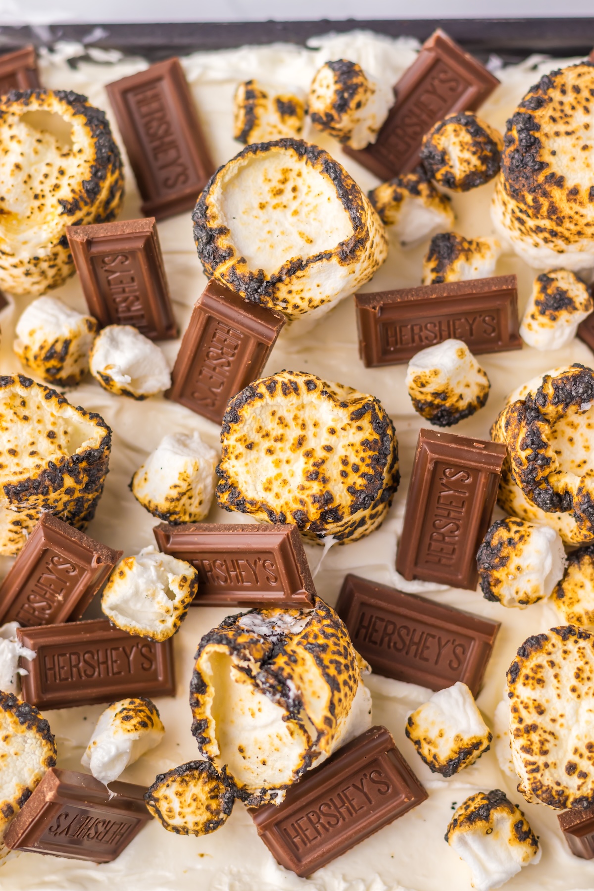 Icebox cake garnished with marshmallows and chocolate