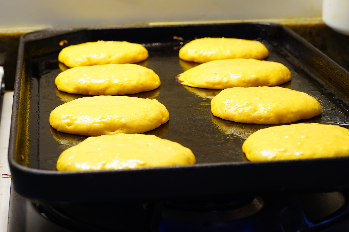 Pumpkin-pancakes-put-on-a-griddle