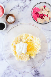 Sour cream and eggs added to the butter and sugar