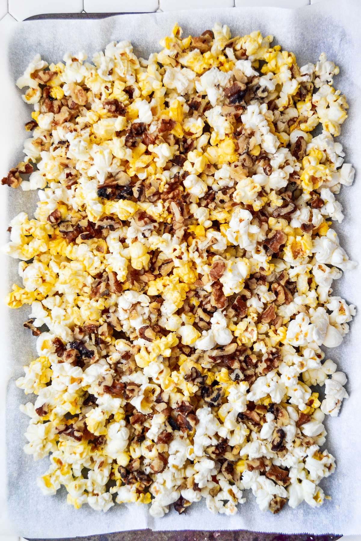 Walnuts sprinkled over popcorn