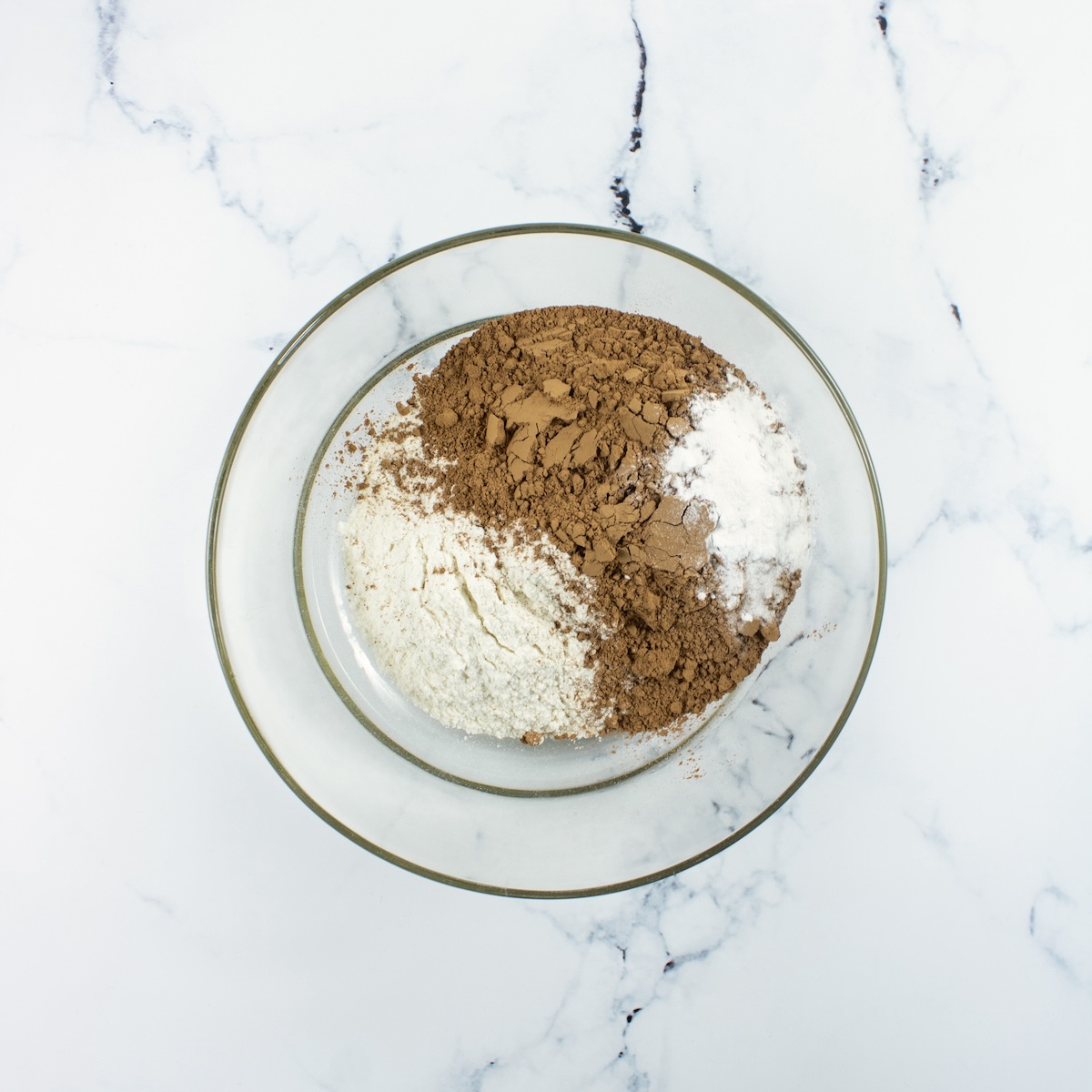 dry ingredients whisked together in a clear glass bowl