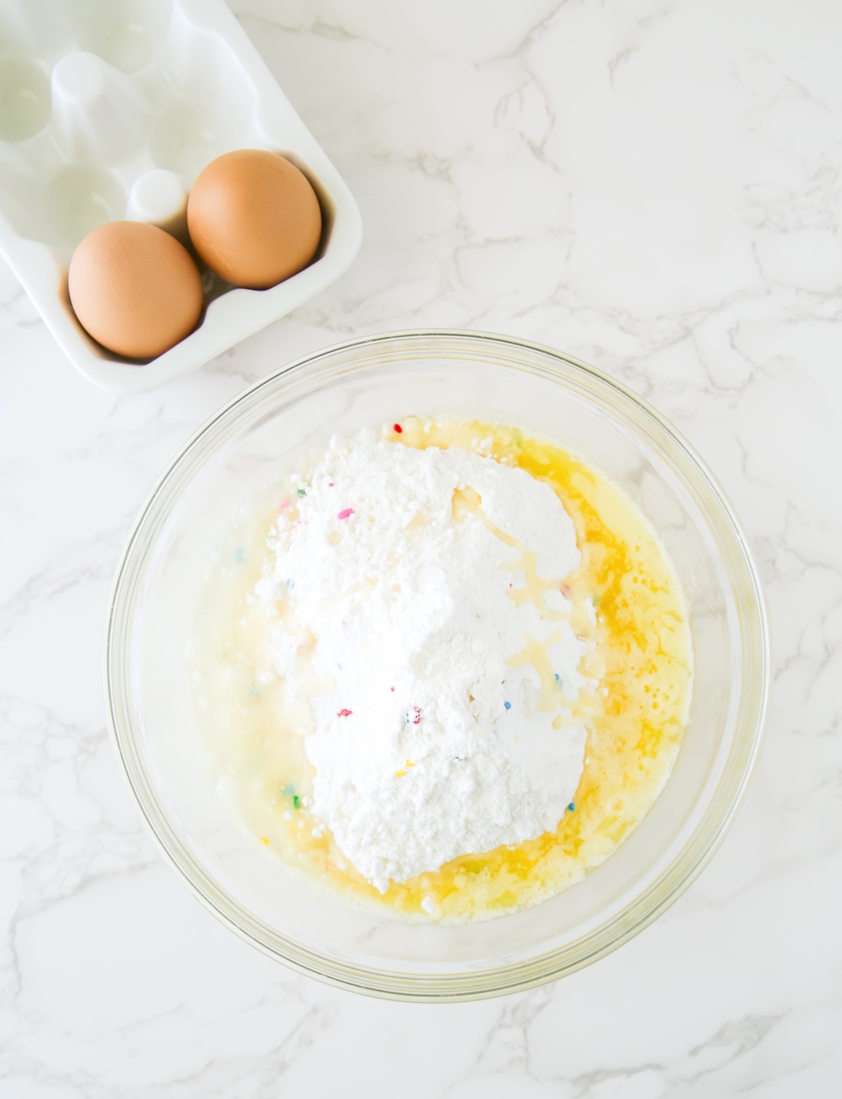 Add-the-cake-mix-oil-butter-and-eggs