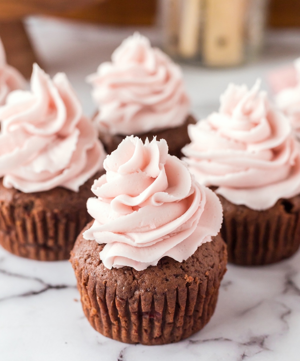 chocolate cherry cupcakes with cherry frosting