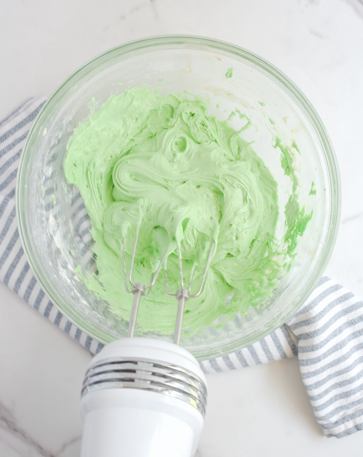 Batter-dyed-green-and-mixed-with-a-mixer