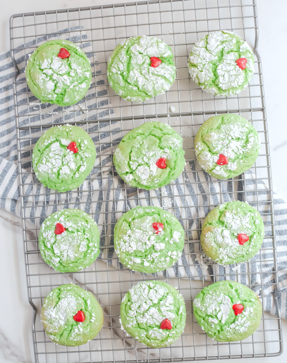 Heart-shapes-pressed-into-the-green-cake-mix-cookies