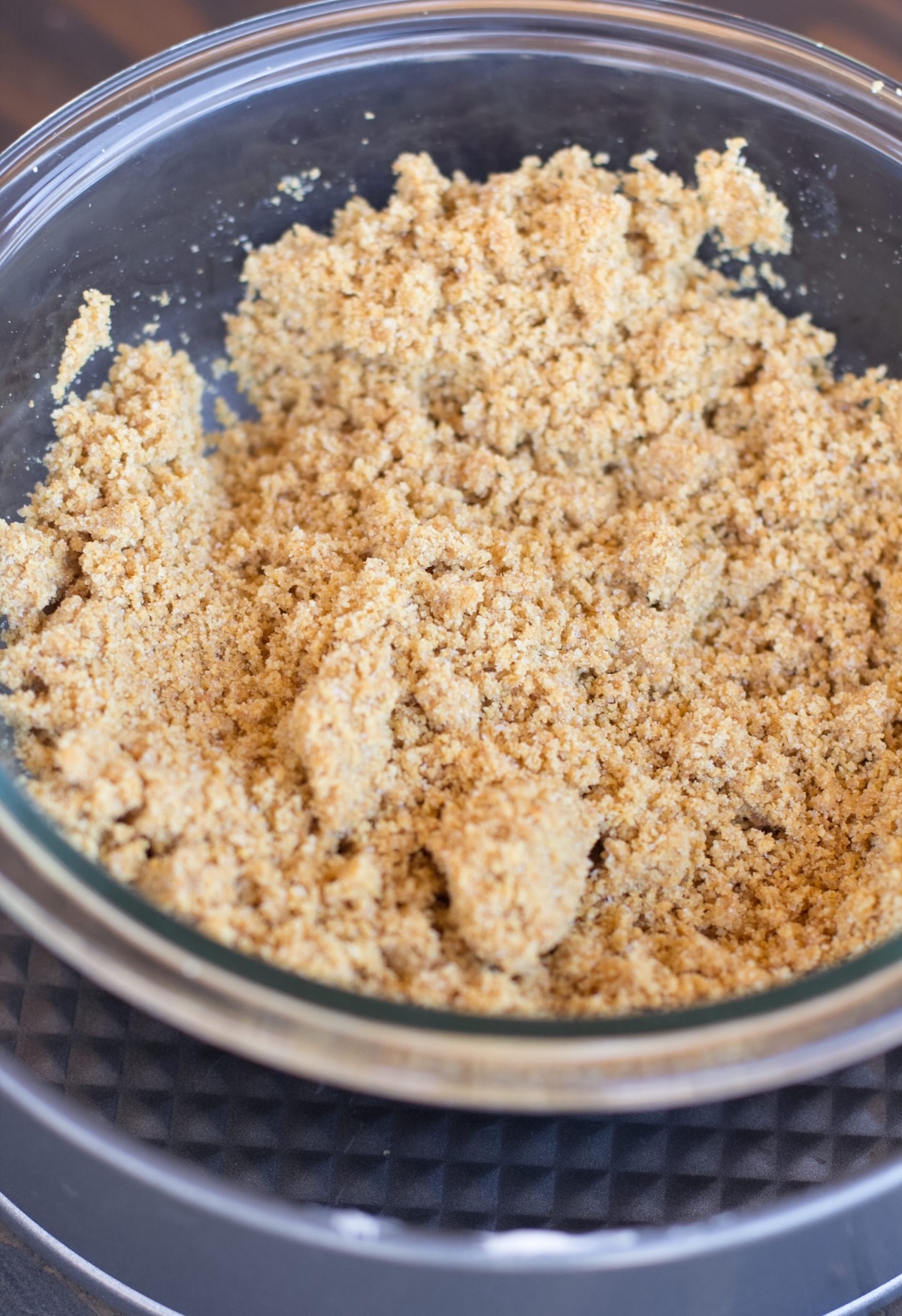 graham cracker crumbs in a bowl with butter