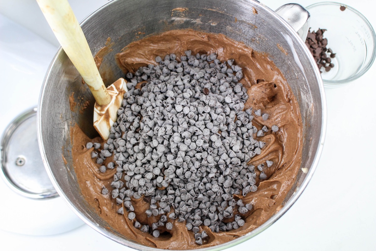 mixing chocolate chips into the chocolate batter