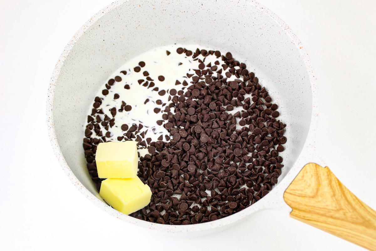 semi-sweet chocolate chips, butter, and heavy cream in a saucepan