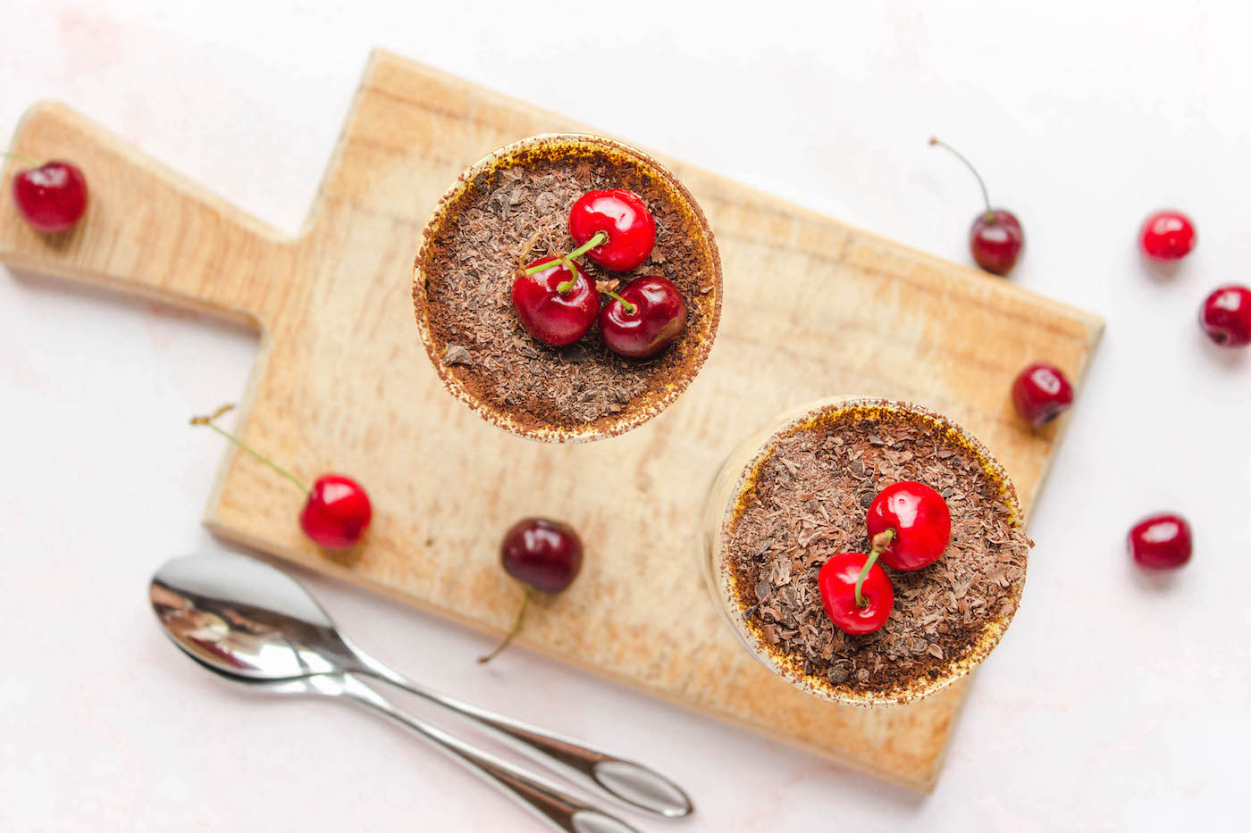 tiramisu dessert in cups on a cutting board