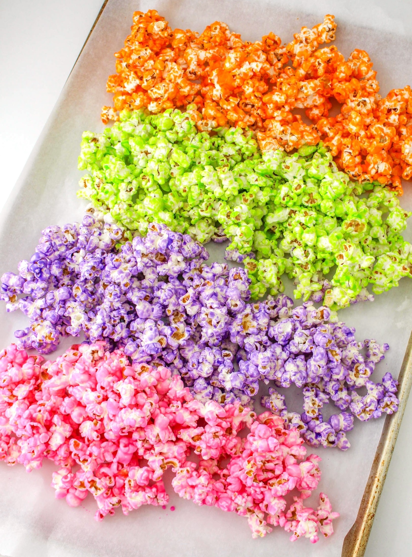 candy popcorn on a cookie sheet