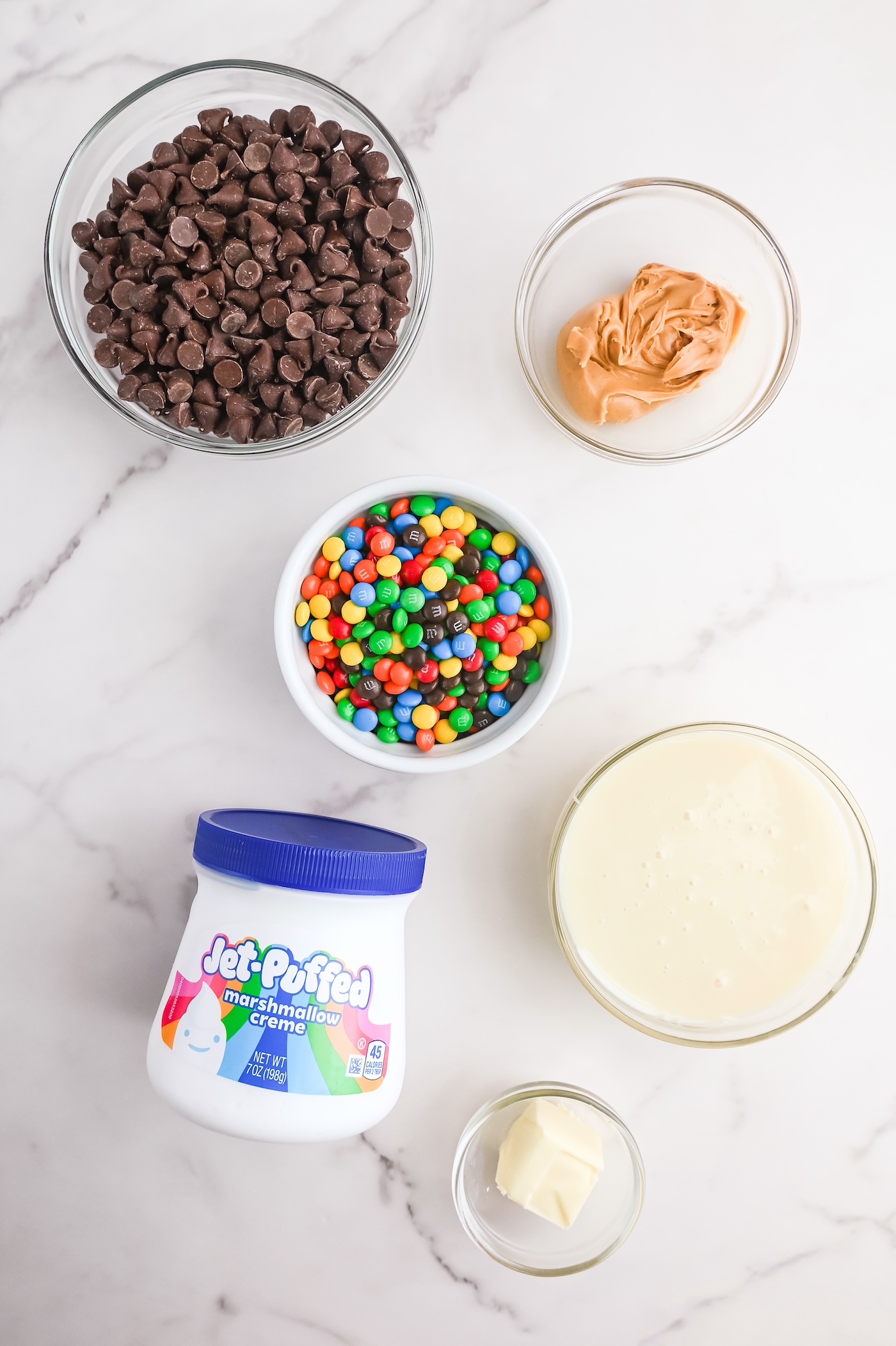 chocolate chips, M&Ms, marshmallow creme, peanut butter, butter, condensed milk