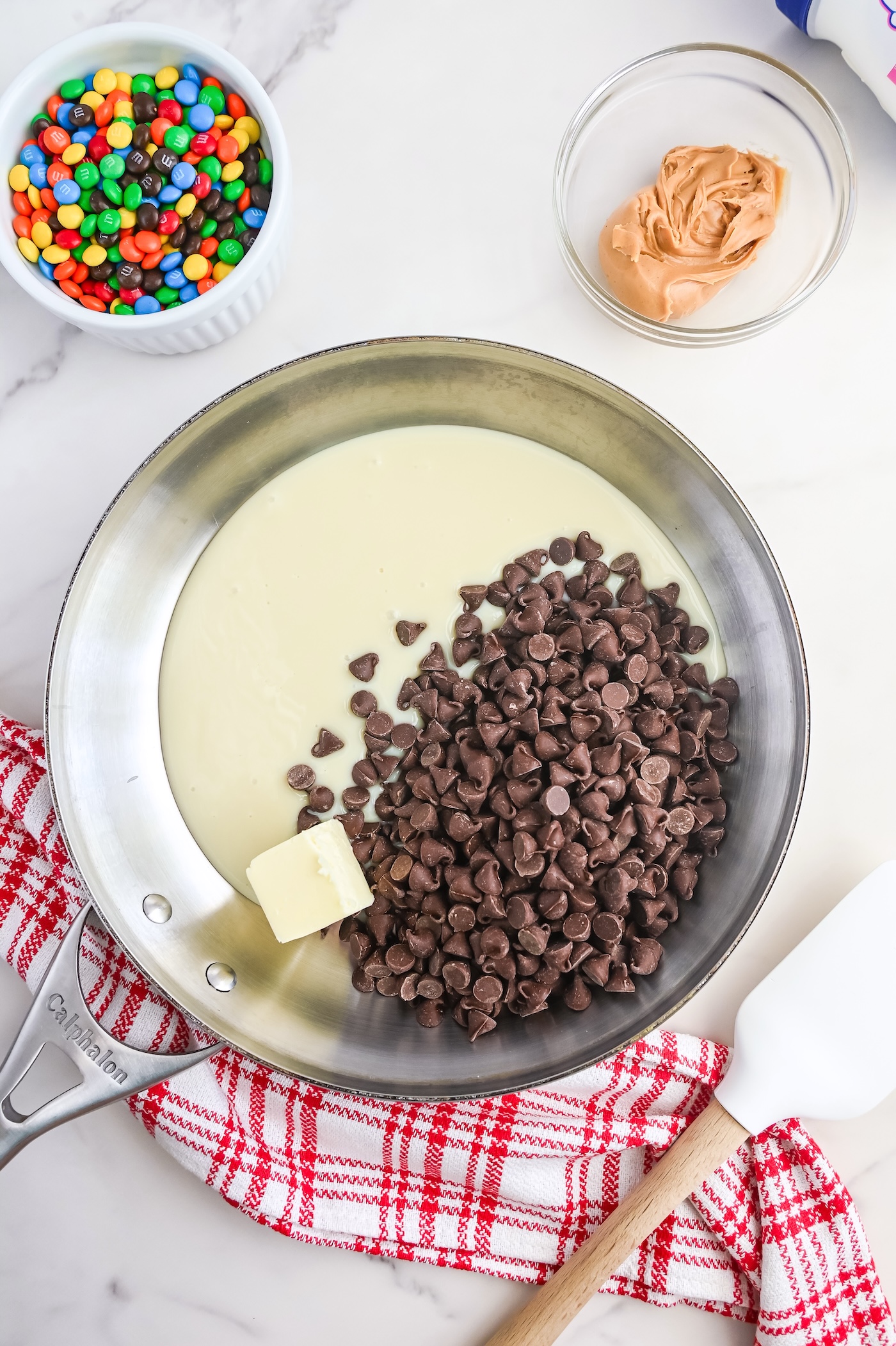 chocolate chips, condensed milk and butter in a bowl