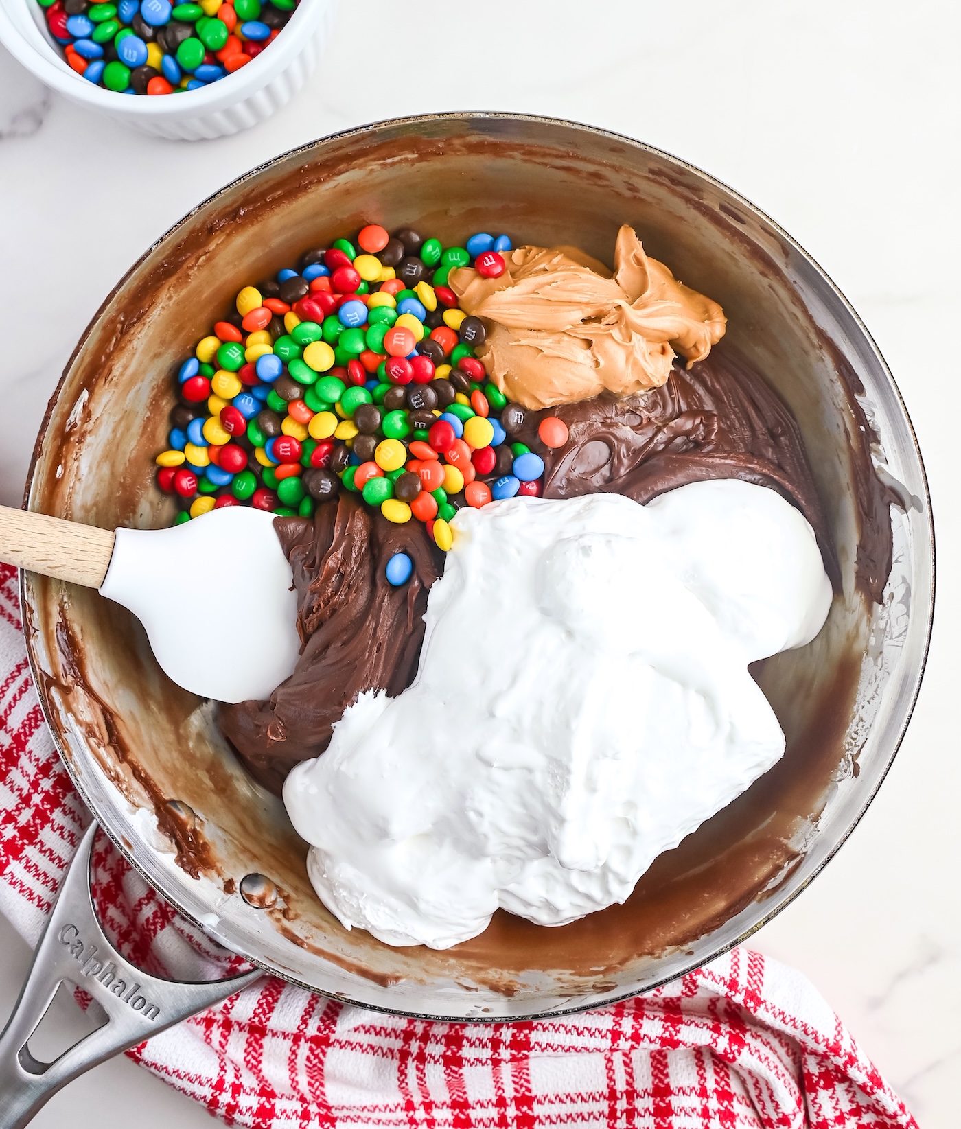 fold in half of the M&M’s, peanut butter and marshmallow creme